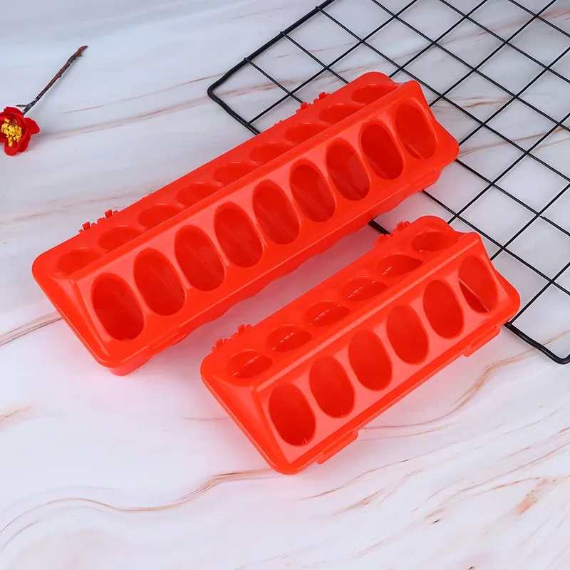Mangeoire au sol en plastique à clapet 12 ou 18 trous